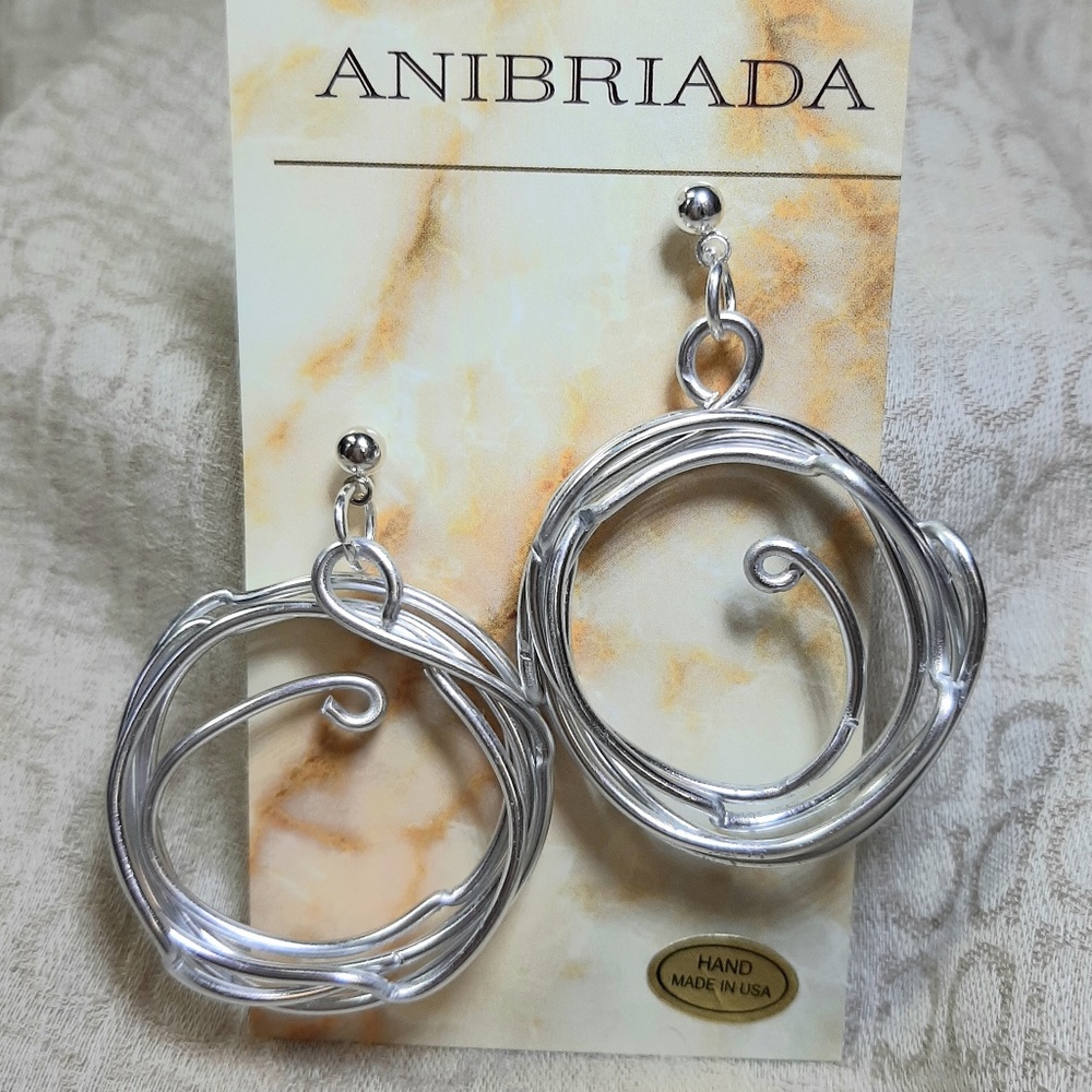 NWT Silver ALUMINUM WIRE Merry Go Round Earrings